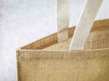 Jute tassen bedrukken voor beurs of relatiegeschenk - stevige en milieuvriendelijke promotietassen